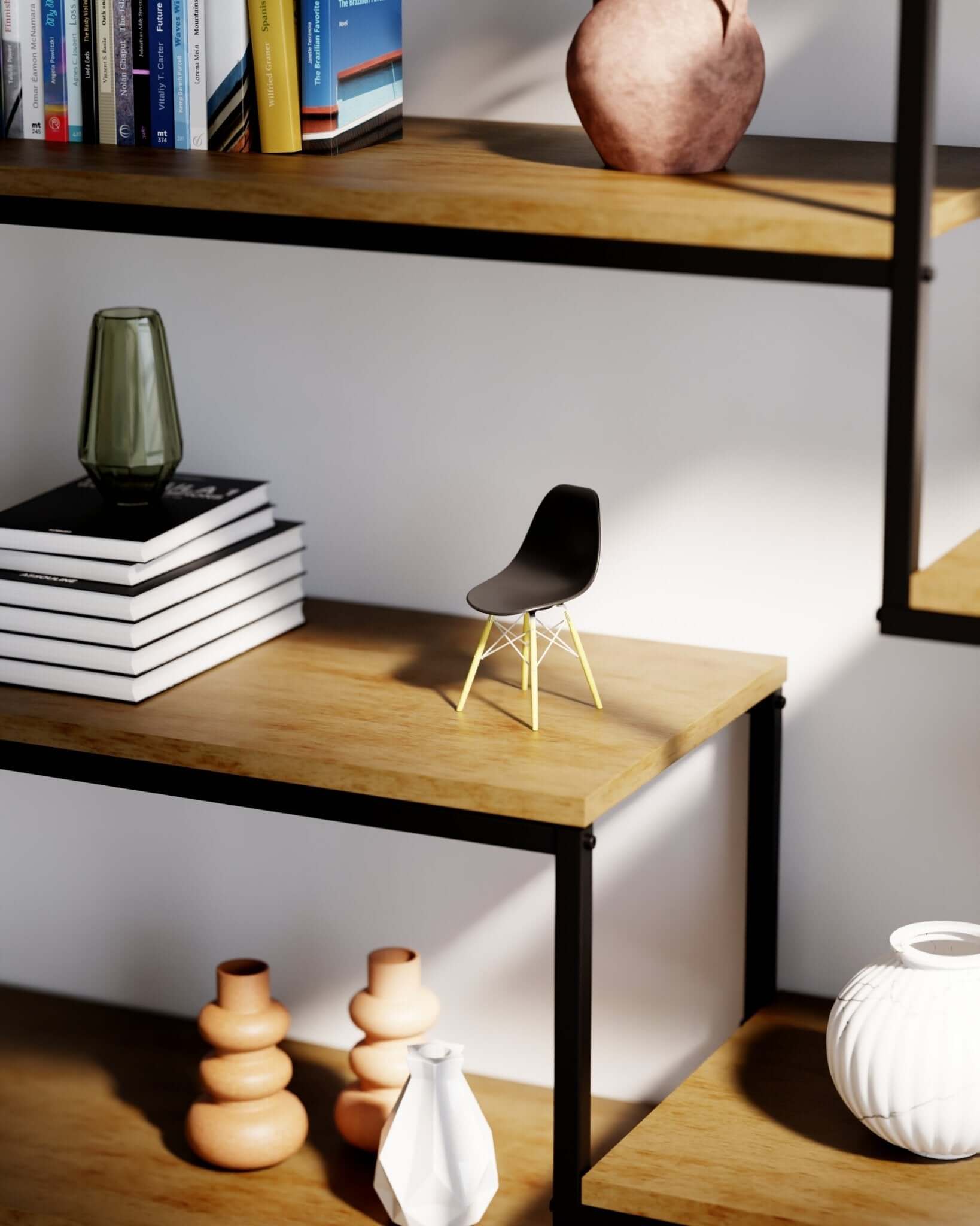 Black MicroShell chair displayed on wooden shelves with books and vases, showcasing mid-century modern design.