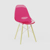 360-degree product rotation showing miniature Clear Magenta MicroShell Chair from every angle - front, sides, and back - highlighting curved shell design and scale details