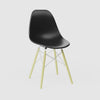 360-degree product rotation showing miniature Black MicroShell Chair from every angle - front, sides, and back - highlighting curved shell design and scale details