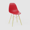 360-degree product rotation showing miniature Red Orange MicroShell Chair from every angle - front, sides, and back - highlighting curved shell design and scale details