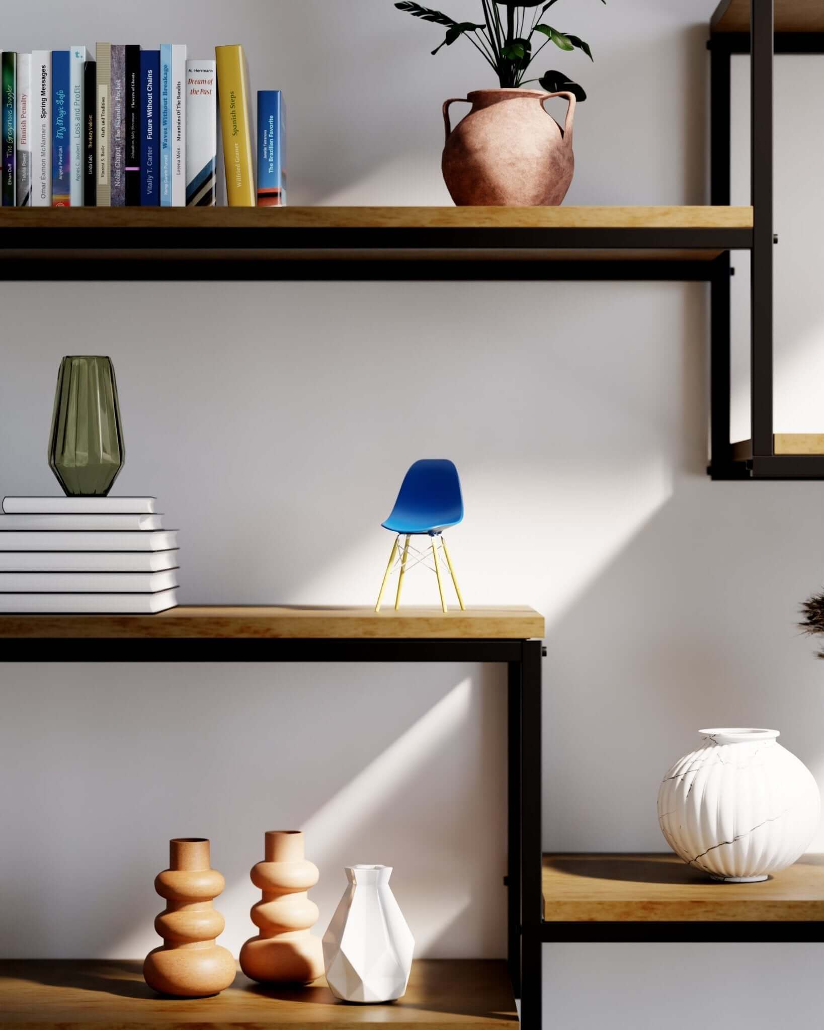 Miniature Ultramarine Blue MicroShell chair displayed on a wooden shelf with books and vases, showcasing mid-century modern design.